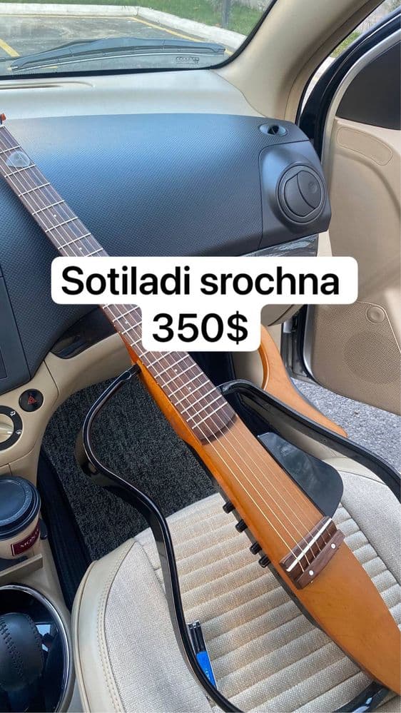 Gitara Yamaha silent 110s o’rtacha holatda.